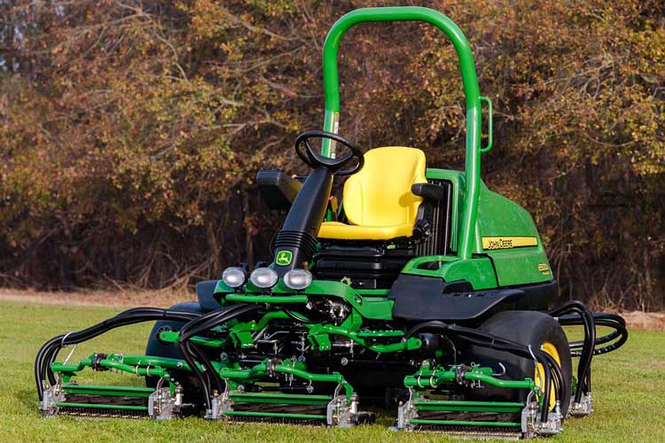 Fairway Mower - John Deere - Golf Course Mowing & Cutting. Photo of operating machinery.