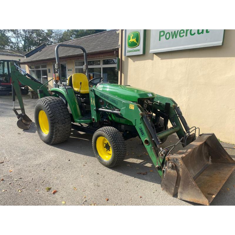 Used John Deere 4610 large chassis compact tractor with Lewis backhoe and front loader