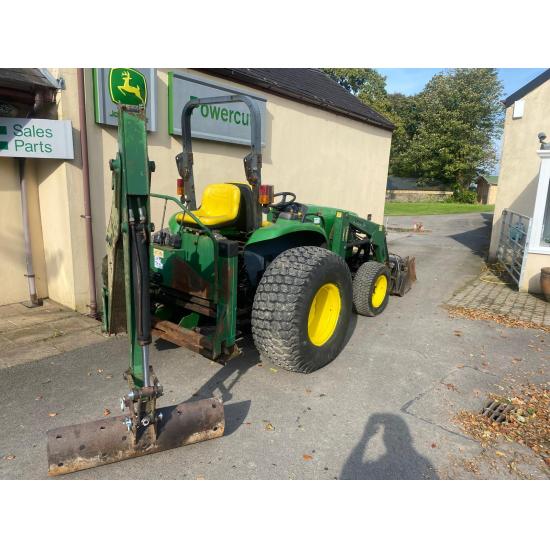 Used John Deere 4610 large chassis compact tractor with Lewis backhoe and front loader