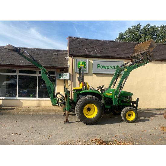 Used John Deere 4610 large chassis compact tractor with Lewis backhoe and front loader