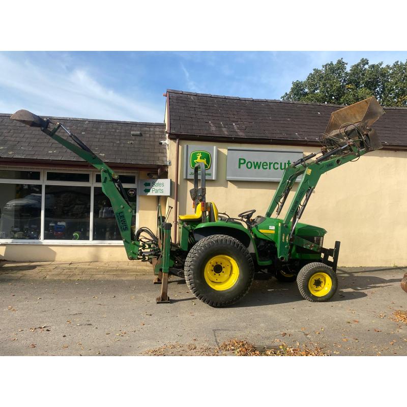 Used John Deere 4610 large chassis compact tractor with Lewis backhoe and front loader