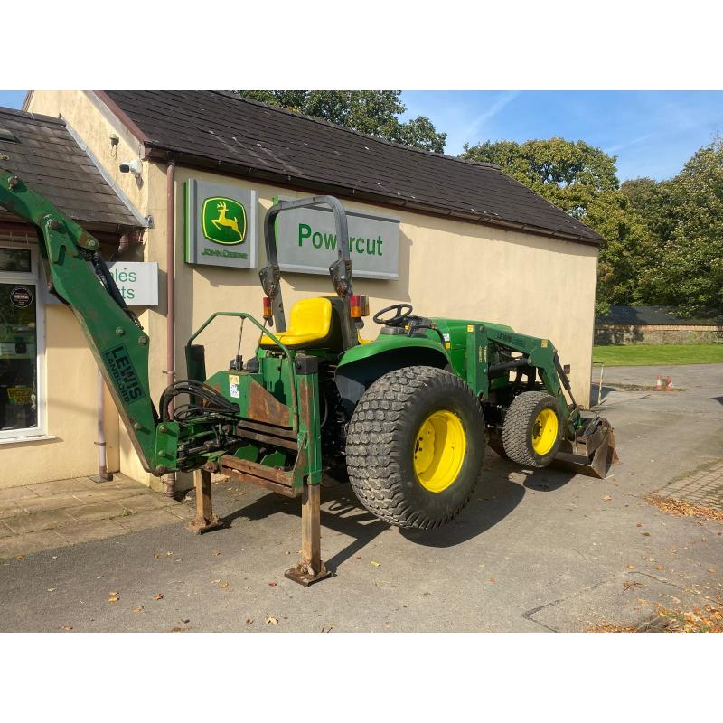 Used John Deere 4610 large chassis compact tractor with Lewis backhoe and front loader