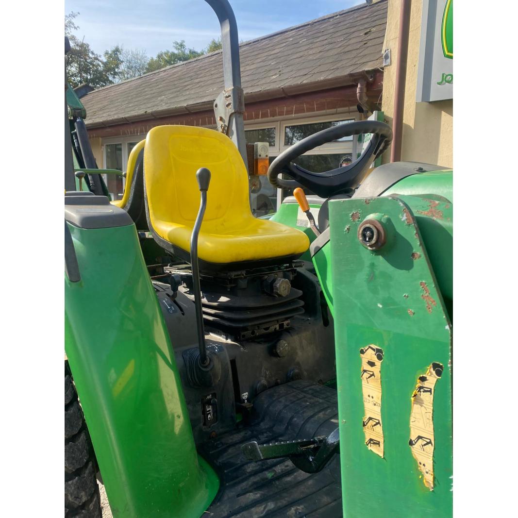 Used John Deere 4610 large chassis compact tractor with Lewis backhoe and front loader