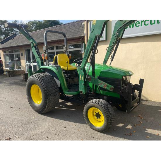Used John Deere 4610 large chassis compact tractor with Lewis backhoe and front loader