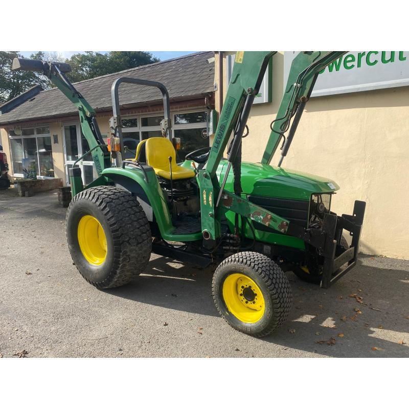 Used John Deere 4610 large chassis compact tractor with Lewis backhoe and front loader