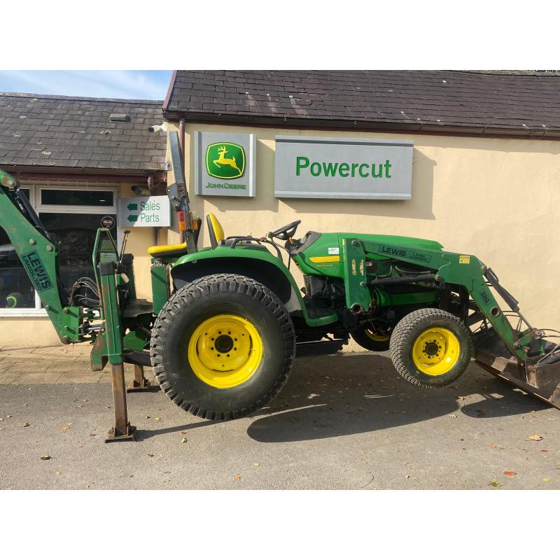 Used John Deere 4610 large chassis compact tractor with Lewis backhoe and front loader