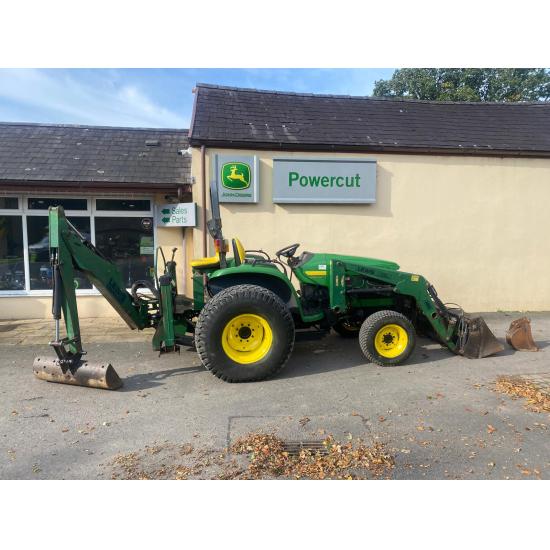 Used John Deere 4610 large chassis compact tractor with Lewis backhoe and front loader