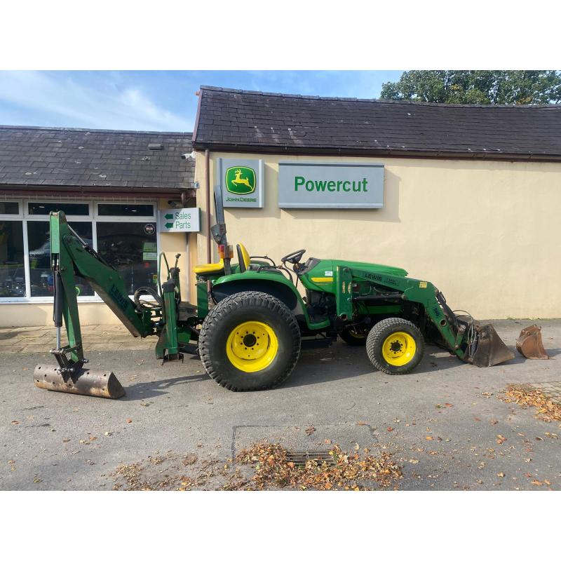 Used John Deere 4610 large chassis compact tractor with Lewis backhoe and front loader